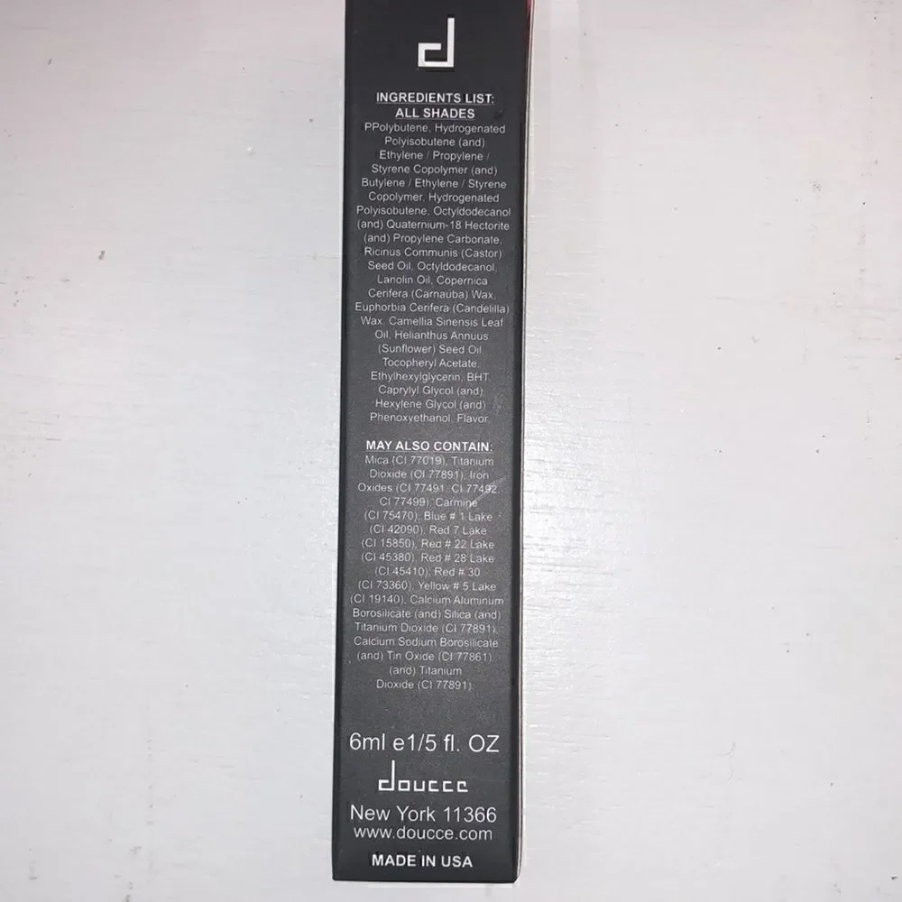 New in box Doucce Gloss wear shiny lip gloss in Color 770 dark coral
